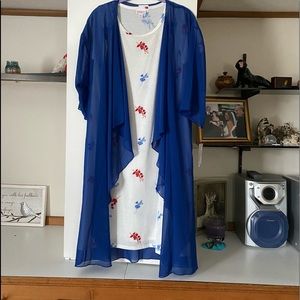 Dress and cover up. Jesse is XS, Shirley is small